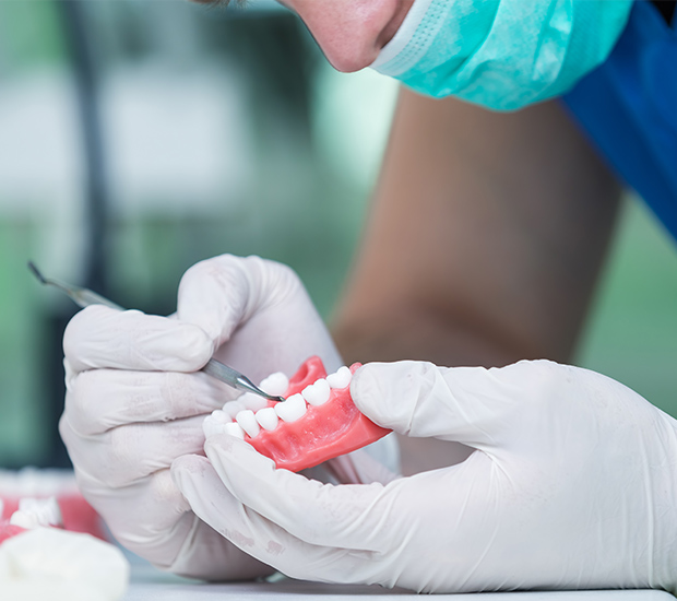 Orange Partial Denture for One Missing Tooth